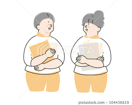 Two nursing staff having a discussion Two nursing staff having a discussion 104436819