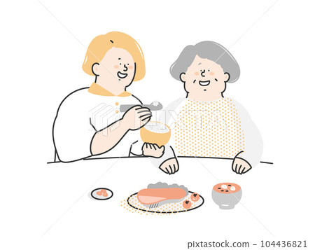 護理人員協助老年婦女用餐 護理人員協助老年婦女用餐 104436821