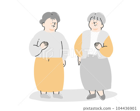 Two senior women enjoying conversation 104436901