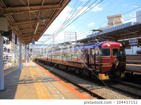 Sightseeing Limited Express "Awoyoshi" entering Yamato-Saidaiji Station on the Kintetsu Nara Line Sightseeing Limited Express "Awoyoshi" entering Yamato-Saidaiji Station on the Kintetsu Nara Line 104437152