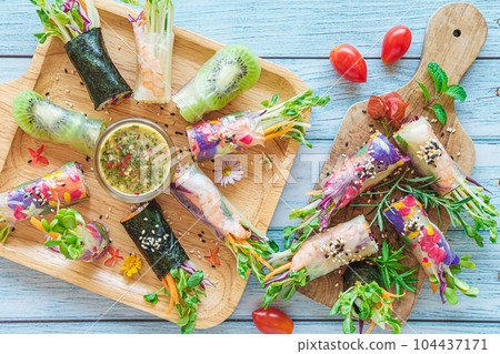 Vegetable salad rolls from rice sheets. 104437171