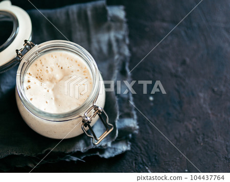 Wheat sourdough starter, copy space 104437764