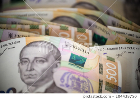 Stack of ukrainian money hryvnia grivna, hryvna with 500 banknotes Stack of ukrainian money hryvnia grivna, hryvna with 500 banknotes 104439750