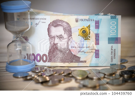 Background 1000 hryvnias. Money texture. Many Ukrainian hryvnias. Ukrainian banknote with Volodymyr Vernadsky 104439760