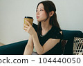 A woman relaxing on the sofa 104440050