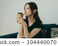 A woman relaxing on the sofa 104440070