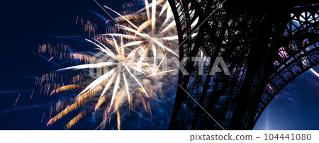 Celebratory colorful fireworks over the Eiffel Tower in Paris, France Celebratory colorful fireworks over the Eiffel Tower in Paris, France 104441080
