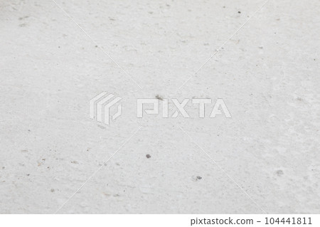 Concrete floor at the construction site close-up. Concrete floor at the construction site close-up. 104441811