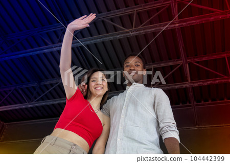 couple on stage crowd salutation standing ovation music concert performance couple on stage crowd salutation standing ovation music concert performance 104442399