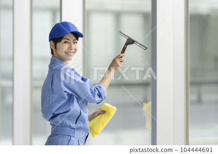 cleaning staff cleaning windows cleaning staff cleaning windows 104444691