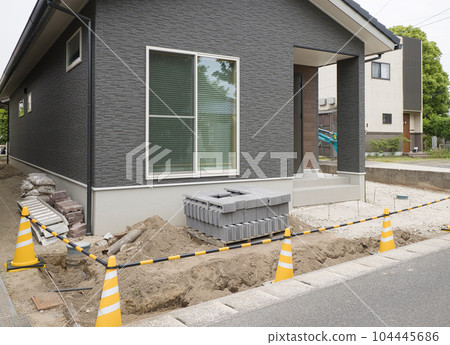 Image of a new construction External construction of a one-story house Image of a new construction External construction of a one-story house 104445686