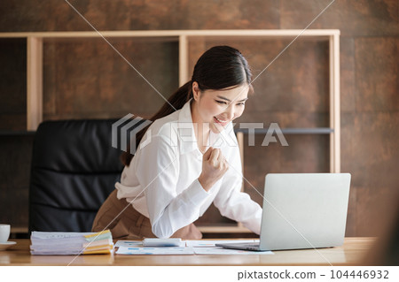 Smart asian Woman working in the Office . Smart asian Woman working in the Office . 104446932