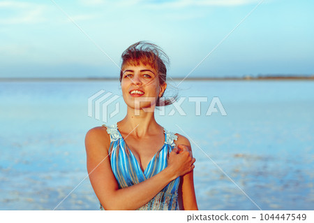a girl in a swimsuit on a salt lake a girl in a swimsuit on a salt lake 104447549
