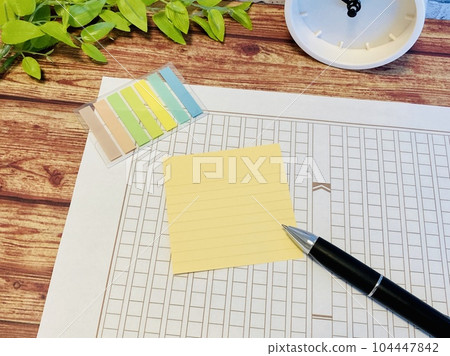 Manuscript paper and sticky notes (with copy space) Manuscript paper and sticky notes (with copy space) 104447842