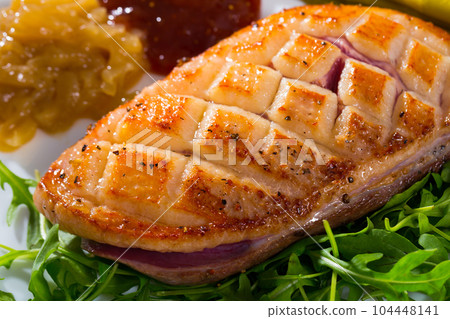 Delicious baked duck breast Magre with arugula, asparagus and sauces Delicious baked duck breast Magre with arugula, asparagus and sauces 104448141