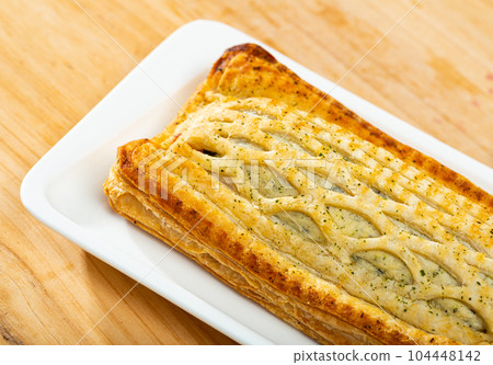 Puff pastry pie with salmon Puff pastry pie with salmon 104448142