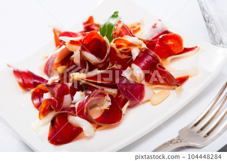 Tasty Spanish snack - duck jamon Tasty Spanish snack - duck jamon 104448284