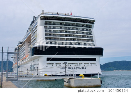 Luxury cruise ship MSC Bellissima anchored at Sakaiminato port Luxury cruise ship MSC Bellissima anchored at Sakaiminato port 104450534