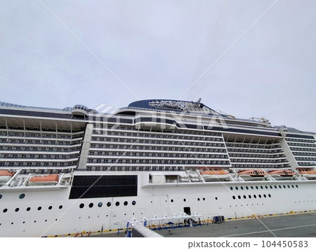 Luxury cruise ship MSC Bellissima anchored at Sakaiminato port 104450583
