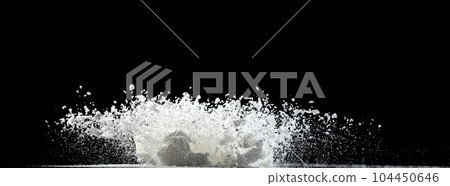 Tapioca starch flour fly explosion, White powder tapioca starch fall down in air. Seasoning flour powder is element material. Eyeshadow crush make up. Black background Isolated selective focus blur 104450646
