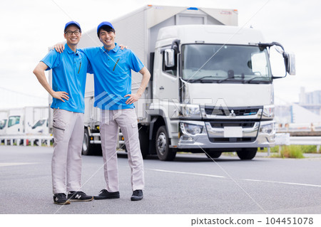Driver standing in front of the truck Driver standing in front of the truck 104451078