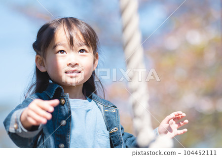 Girls playing in the park Girls playing in the park 104452111