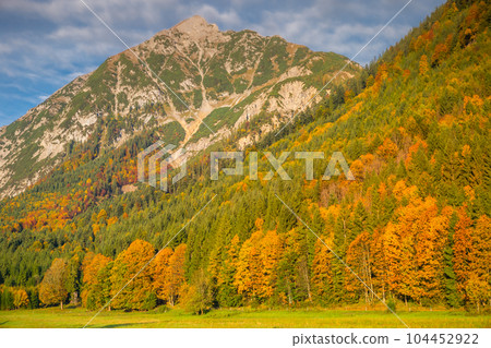 Karwendel alps at golden autumn sunrise, tyrol and bavarian alps border, Austria Karwendel alps at golden autumn sunrise, tyrol and bavarian alps border, Austria 104452922