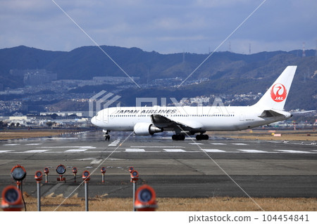 Takeoff and landing at Osaka Itami Airport Takeoff and landing at Osaka Itami Airport 104454841