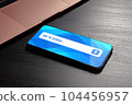 Voice search and speech recognition with stunning close-up of smartphone with voice search bar on the screen. Say to search high-quality photo concept 104456957