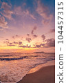 Tropical beach with smooth wave and sunset sky abstract background. Copy space of business summer vacation and travel adventure concept. Vintage tone filter effect color style. 104457315