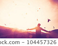 Freedom feel good and travel adventure concept. Copy space of silhouette man rising hands on sunset sky double exposure colorful bokeh and bird fly background. Vintage tone filter effect color style. 104457326