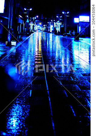 Night view on a rainy day seen from the train window Night view on a rainy day seen from the train window 104458064