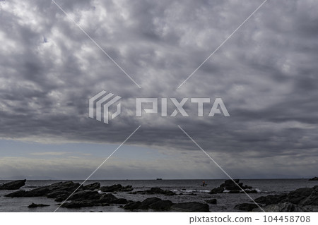 Staring at the light blue sky far from the coast Staring at the light blue sky far from the coast 104458708