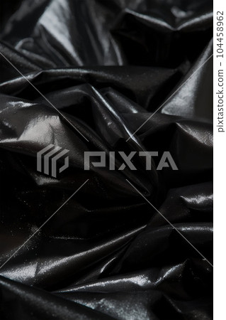 Black transparent background of flowing fabric, in the style of monochrome colors. Ai generative art 104458962