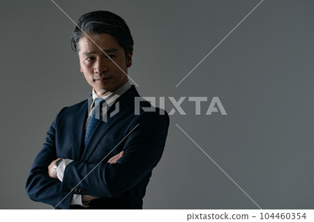 A man with his arms folded Business 104460354