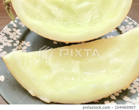 Cut melon skin placed on a plate photo material 104460907