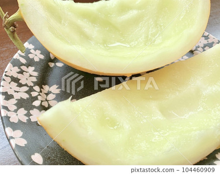 Cut melon skin placed on a plate photo material 104460909