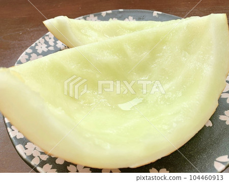 Cut melon skin placed on a plate photo material 104460913