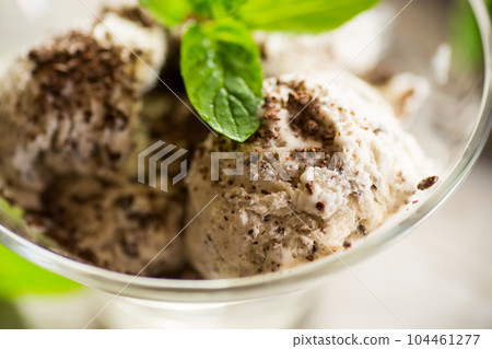 homemade ice cream with pieces of grated dark chocolate 104461277