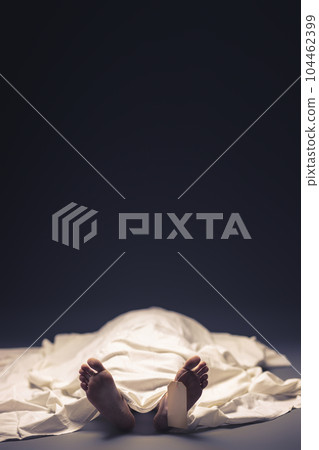 feet of corpse lying 104462399