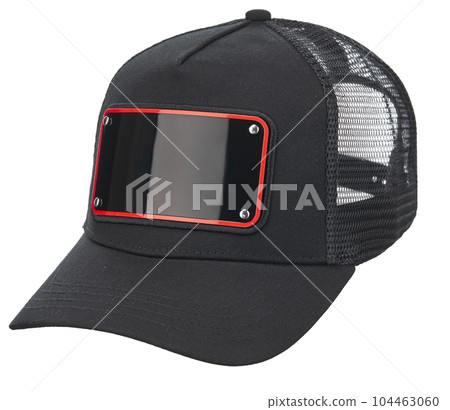 Cotton cap in black colors, with a visor, with a black glossy metal plate in front and a ventilated mesh at the back, isolated on a white background. Cotton cap in black colors, with a visor, with a black glossy metal plate in front and a ventilated mesh at the back, isolated on a white background. 104463060