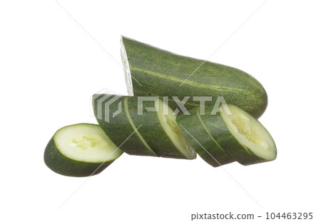 Cucumber fly fall, green fresh vegetable cucumber cut chop slice. Organic fresh vegetable with eaten leaf of long cucumber, close up texture. White background isolated freeze motion high speed shutter Cucumber fly fall, green fresh vegetable cucumber cut chop slice. Organic fresh vegetable with eaten leaf of long cucumber, close up texture. White background isolated freeze motion high speed shutter 104463295