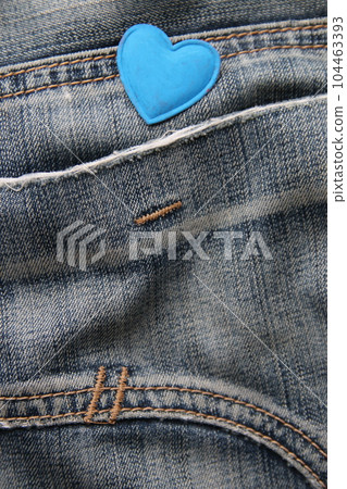 Blue heart on jeans. Birthday background. Blue heart on jeans. Birthday background. 104463393