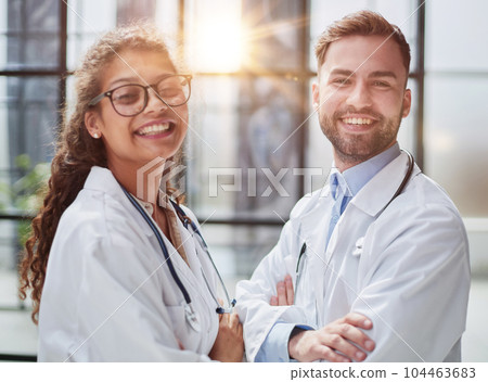 two of medical workers portrait in hospital 104463683