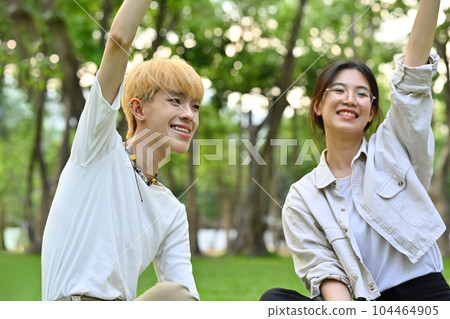 Gen Z friends university students having fun talking spending time together at campus. Education and youth lifestyle concept Gen Z friends university students having fun talking spending time together at campus. Education and youth lifestyle concept 104464905