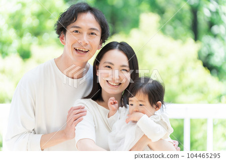 A smiling family of three (family, childcare, childcare, baby) A smiling family of three (family, childcare, childcare, baby) 104465295