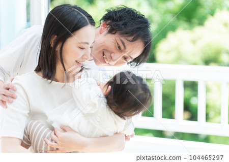 A smiling family of three (family, childcare, childcare, baby) A smiling family of three (family, childcare, childcare, baby) 104465297