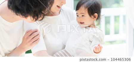 A smiling family of three (family, childcare, childcare, baby) A smiling family of three (family, childcare, childcare, baby) 104465306
