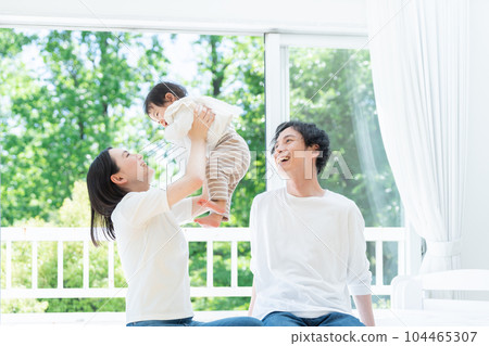 A smiling family of three (family, childcare, childcare, baby) 104465307