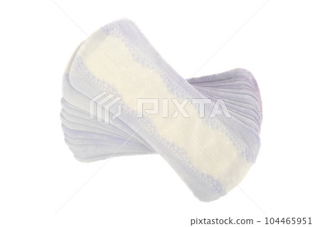 Top view of a stack of purple and white sanitary pads on a white background. 104465951